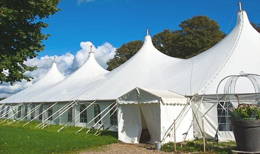 a line of sleek and modern portable toilets ready for use at an upscale corporate event in Nixon